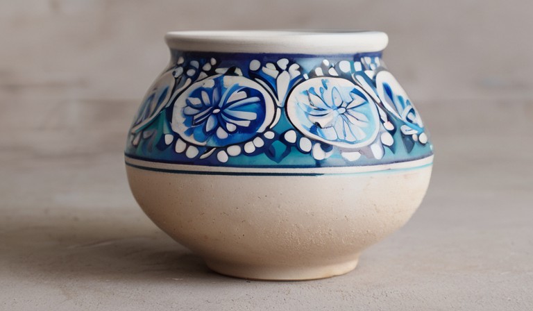 Can You Paint Over Glazed Pottery: A Guide