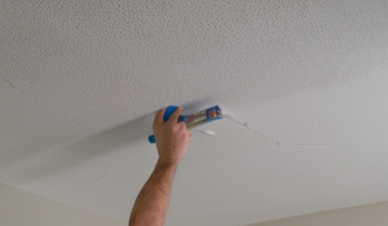 A Step-by-Step Guide to Painting a Popcorn Ceiling Using a Roller