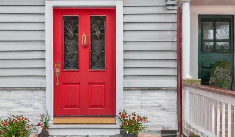 Unveiling the Symbolism: Decoding the Meaning Behind a Red Door on a House
