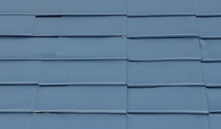 The Benefits of Painting Your Roof Blue: Energy Efficiency and Style